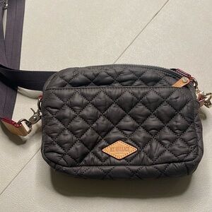Almost new MZ Wallace cross body.  Brownish charcoal in color.